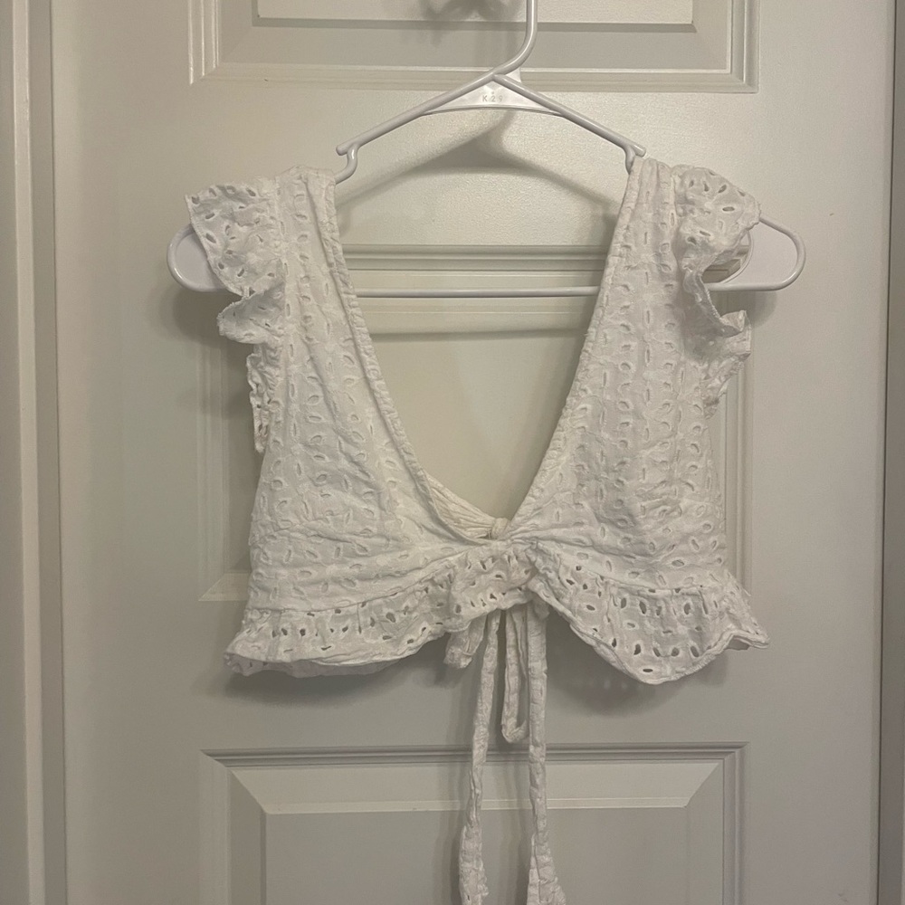 white woven style top with tie in back